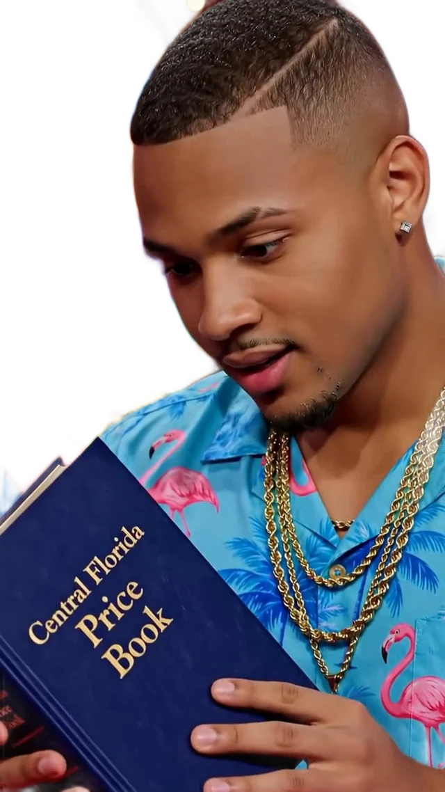Lil Prices, host of The Price Is Fright, reading the Central Florida Price Book